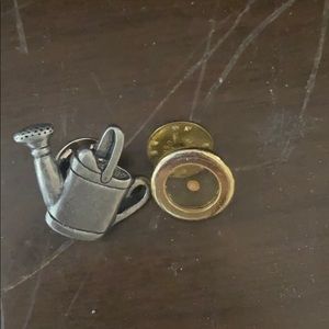 Two pens: mustard seed and watering pitcher